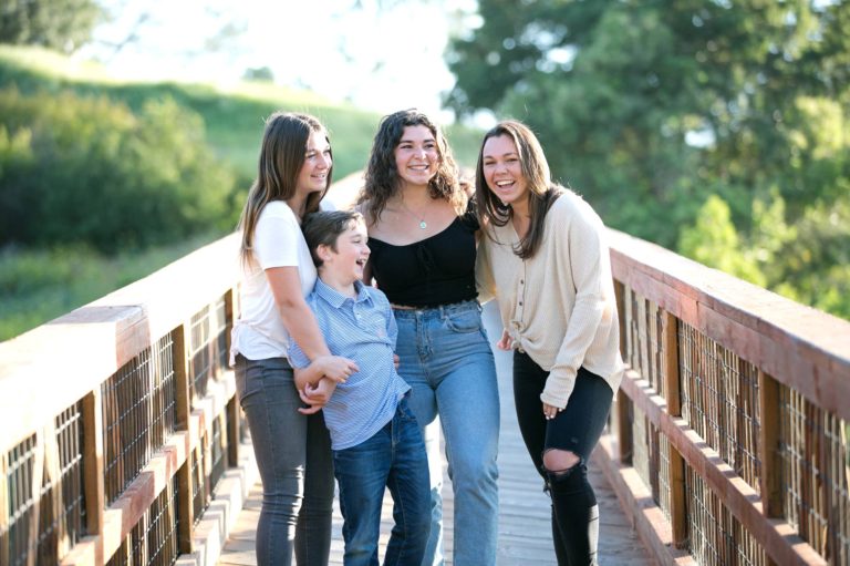 family photo on bridge